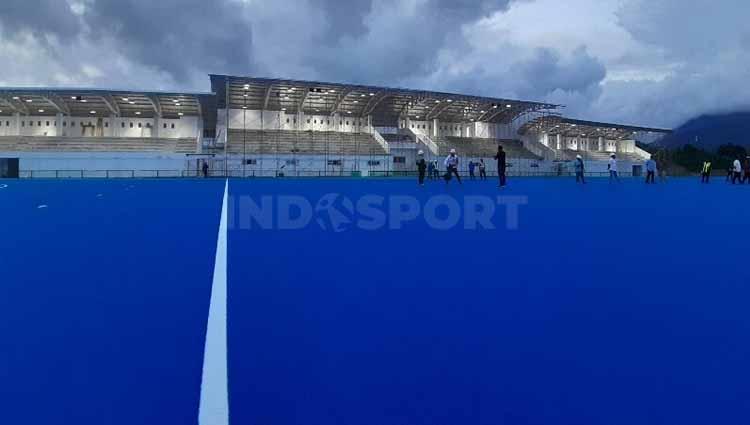 Venue Hoki Outdoor untuk PON XX Papua. Copyright: Sudjarwo/INDOSPORT