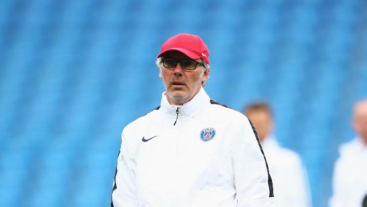 Laurent Blanc saat masih menjadi pelatih Paris Saint-Germain (PSG). - INDOSPORT