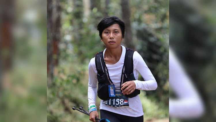 Kisah pelari lintas alam wanita Indonesia Eni Rosita yang bisa bangkit usai disiram air keras oleh orang tak dikenal beberapa tahun lalu. - INDOSPORT