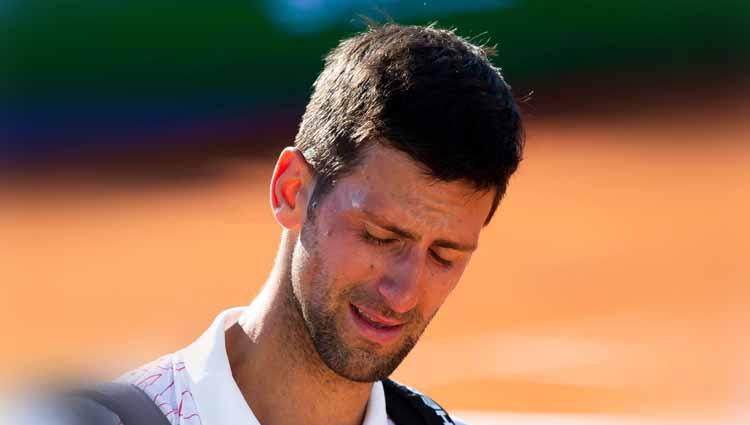 Novak Djokovic dari Serbia meneteskan air mata usai kalah dari Alexander Zverev, dalam tur musim panas Adria, 2020 di Beograd, Serbia.