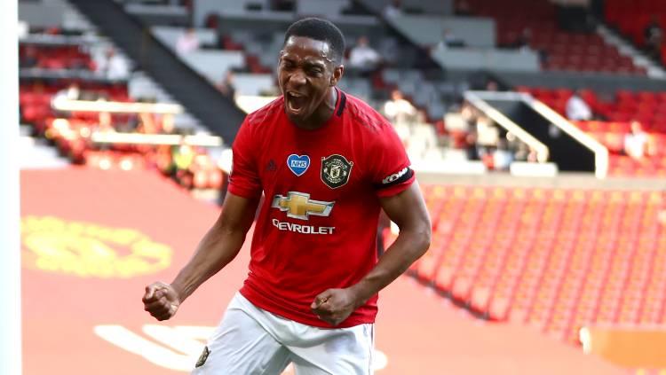 Anthony Martial merayakan gol ketiganya pada pertandingan Liga Inggris antara Manchester United vs Sheffield United, Kamis (25/06/20). Copyright: Michael Steele/Getty Images