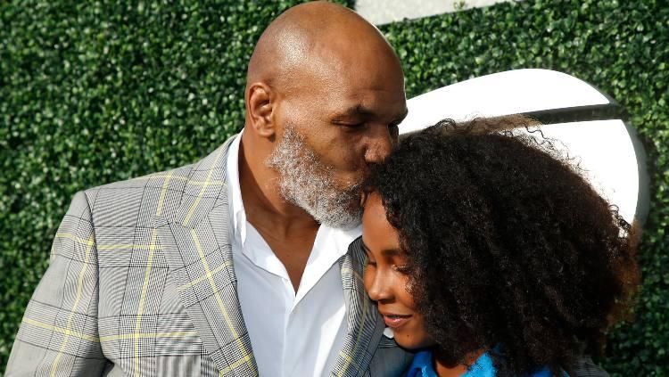 Mike Tyson bersama sang putri, Milan. - INDOSPORT