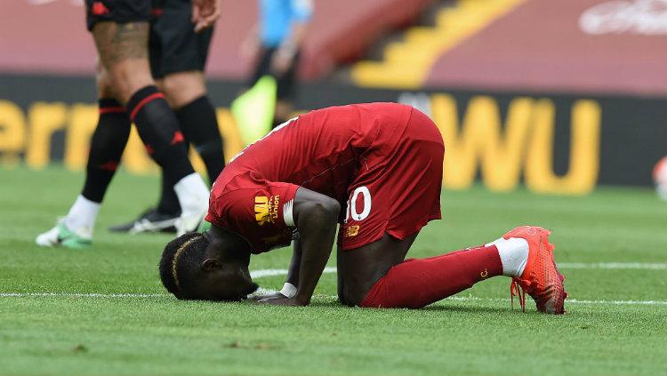 Selebrasi gol Sadio Mane di laga Liverpool vs Aston Villa. Copyright: John Powell/Liverpool FC via Getty Images