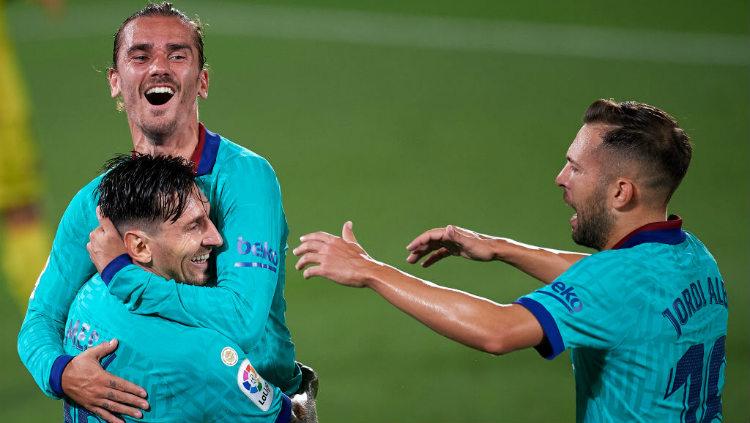 Selebrasi Lionel Messi dan Antoine Griezmann di pekan ke-34 LaLiga Villarreal vs Barcelona Copyright: Jose Breton/Pics Action/NurPhoto via Getty Images