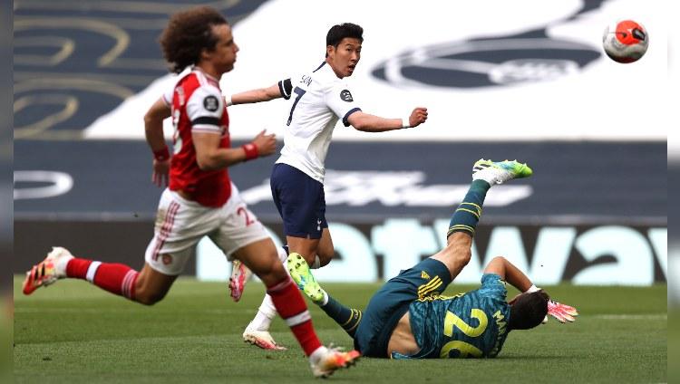 Hasil pertandingan Tottenham Hotspur vs Arsenal di ajang Liga Inggris 2019-20 berakhir dengan skor 2-1, Minggu (12/07/20) malam. - INDOSPORT