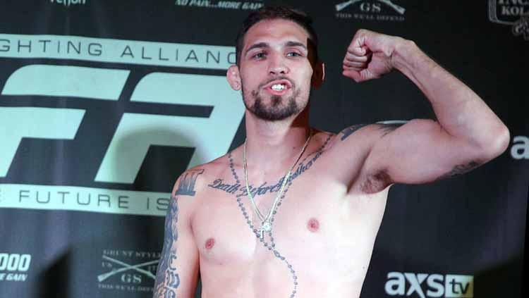 Petarung Mixed Martial Arts (MMA), Shawn West harus didiskualifikasi setelah membuat lawannya Boston Salmon nyaris tewas saat bertanding. - INDOSPORT