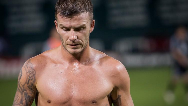 David Beckham dikenal memiliki body atletis dan wajah tampan.