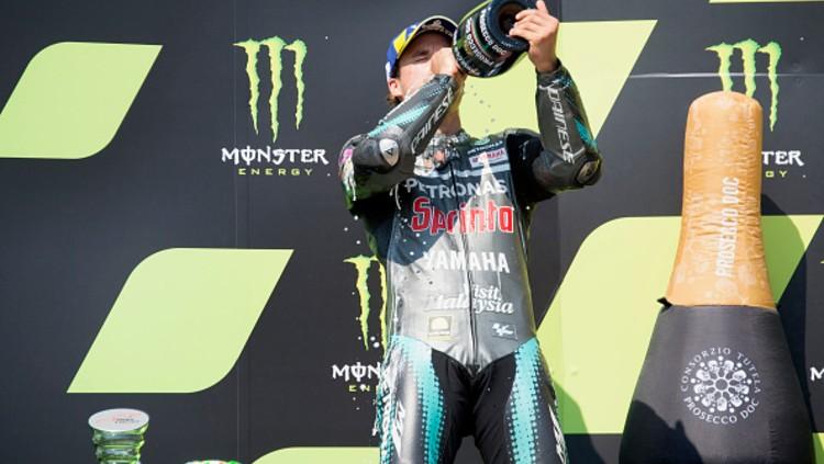 Naik podium untuk pertama kalinya di MotoGP, Morbidelli pun mengungkapkan rasa terima kasihnya ke Valentino Rossi. - INDOSPORT