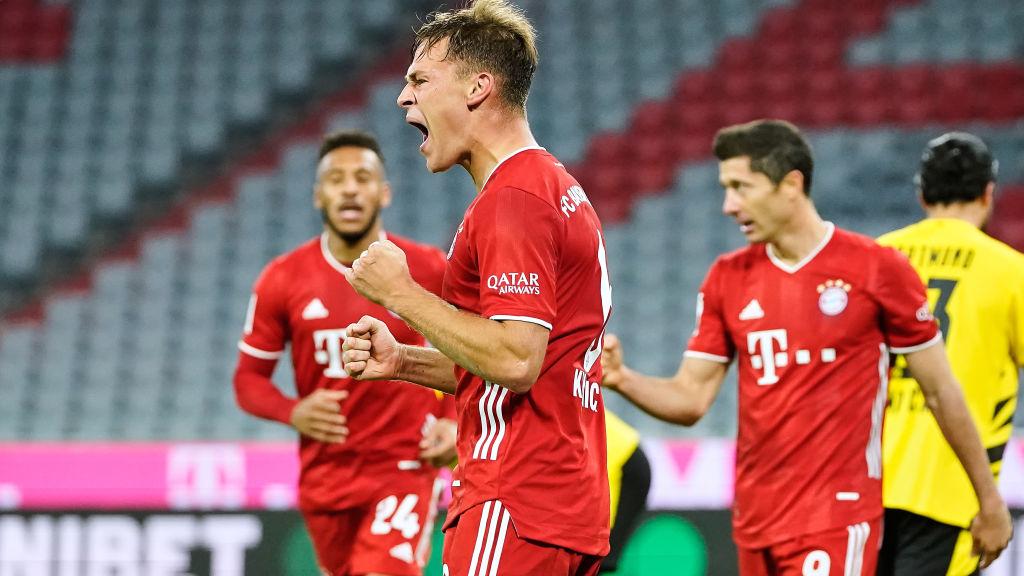 Selebrasi Joshua Kimmich usai mencetak gol kemenangan Bayern Munchen atas Borussia Dortmund - INDOSPORT