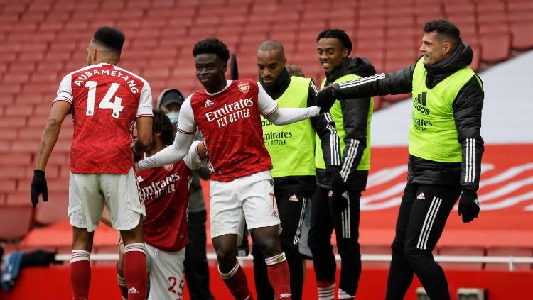 Bukayo Saka merayakan golnya dalam pertandingan Liga Inggris antara Arsenal vs Sheffield United, Minggu (04/02/20) Copyright: Kirsty Wigglesworth - Pool/Getty Images