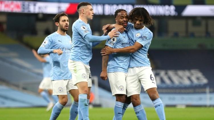 Raheem Sterling merayakan gol sematawayangnya dalam duel Manchester City vs Arsenal