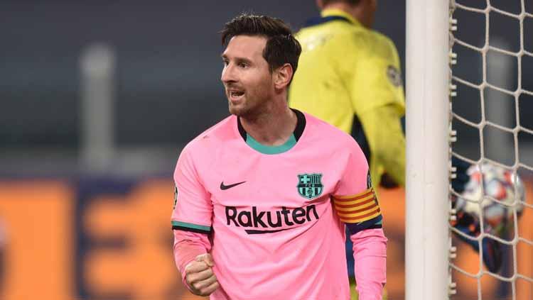Lionel Messi dari Barcelona merayakan setelah mencetak gol kedua timnya dari titik penalti selama pertandingan penyisihan Grup G Liga Champions UEFA antara Juventus dan FC Barcelona - INDOSPORT