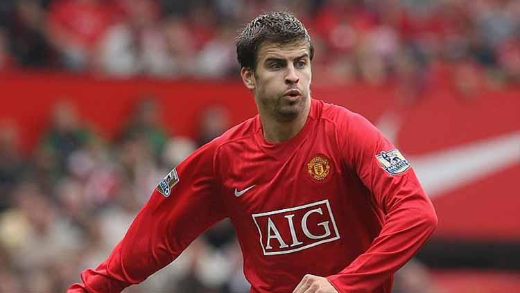 Gerard Pique, saat bermain di Manchester United. Copyright: John Peters/Manchester United via Getty Images