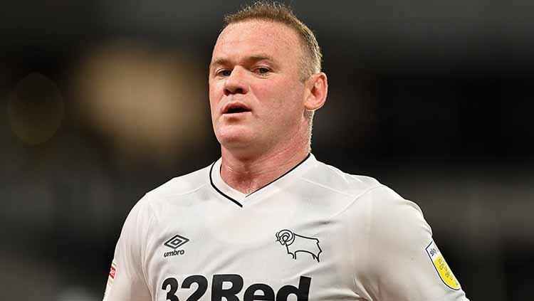 Melihat ambisi Wayne Rooney jadi manajer permanen di Derby County. - INDOSPORT