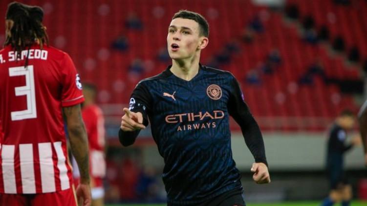 Phil Foden merayakan gol Manchester City atas Olympiacos di Liga Champions
