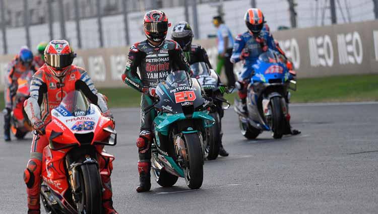 Pembalap MotoGP berada di grid sebelum start di Sirkuit Algarve, Portugal.