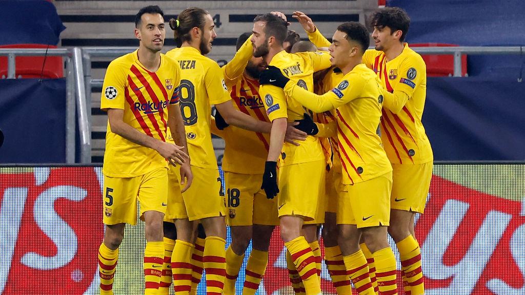 Antoine Griezmann selebrasi usai mencetak gol untuk Barcelona di Liga Champions.