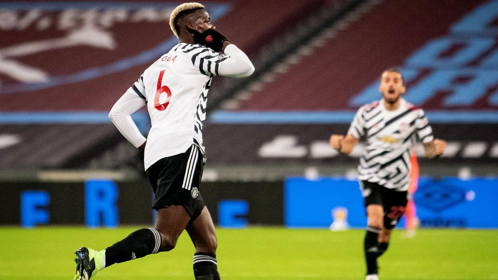 Paul Pogba berselebrasi usai mencetak gol di laga West Ham vs Manchester United Copyright: Ash Donelon/Manchester United via Getty Images