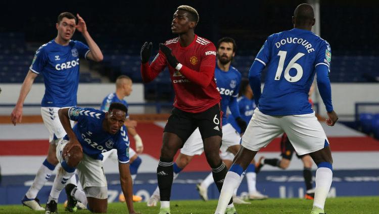 Manchester United berpotensi kehilangan sejumlah pemain bintang yang kontraknya segera berakhir, termasuk Paul Pogba. - INDOSPORT