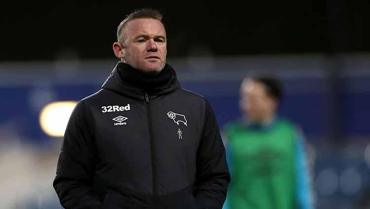 Pelatih Derby County, Wayne Rooney berniat untuk membajak wonderkid Manchester United yakni Amad Diallo pada bursa transfer Januari 2022. - INDOSPORT