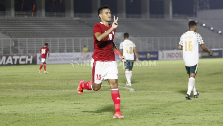 M Rafli berselebrasi usai mencetak gol kedua Timnas Indonesia U-23 ke gawang Tira Persikabo. - INDOSPORT
