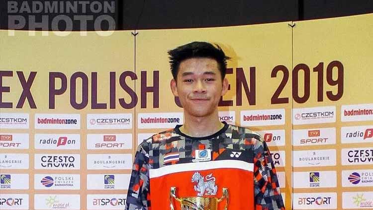 Tunggal putra Thailand, Kunlavut Vitidsarn menyebut gaya rambutnya jadi jimat keberuntungan selama berjuang di turnamen bulutangkis Indonesia Masters 2021. - INDOSPORT
