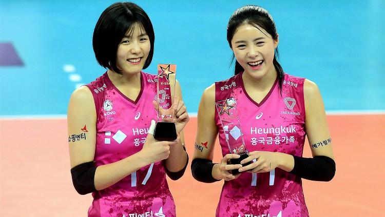 Lee Jae-yeong dan Lee Da-yeong, atlet kembar Korea Selatan, melakukan bully.