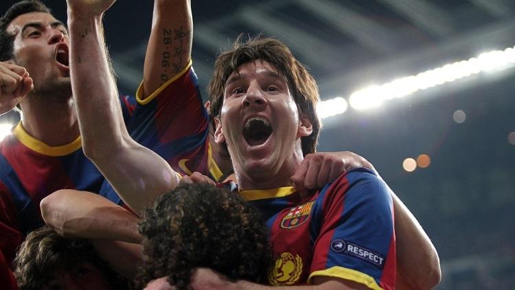 Selebrasi Lionel Messi usai membawa Barcelona mengalahkan Real Madrid di semifinal Liga Champions, 27 April 2011. - INDOSPORT
