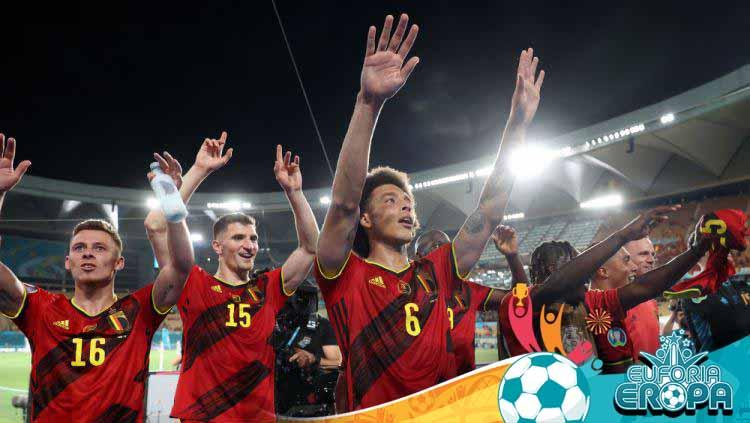 Belgia merayakan lolos ke perempat final Euro 2020. - INDOSPORT