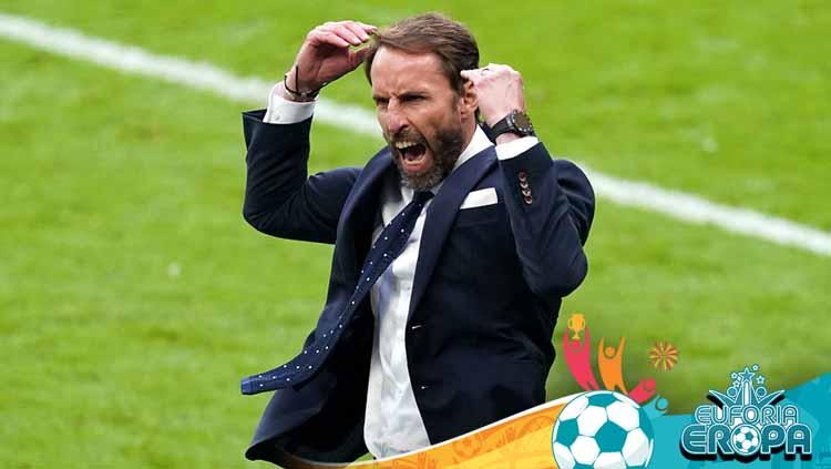Pelatih Timnas Inggris, Gareth Southgate merayakan kemenangan setelah peluit akhir dibunyikan pada pertandingan babak 16 besar UEFA Euro 2020