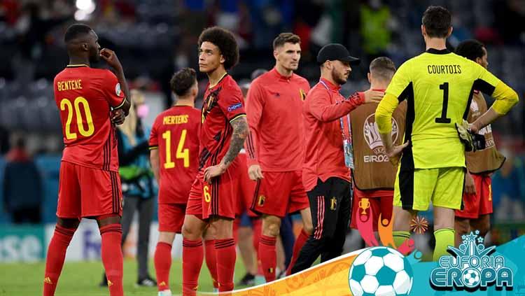Para pemain Belgia terlihat sedih setelah kalah pertandingan perempat final Kejuaraan UEFA Euro 2020 antara Belgia dan Italia. - INDOSPORT