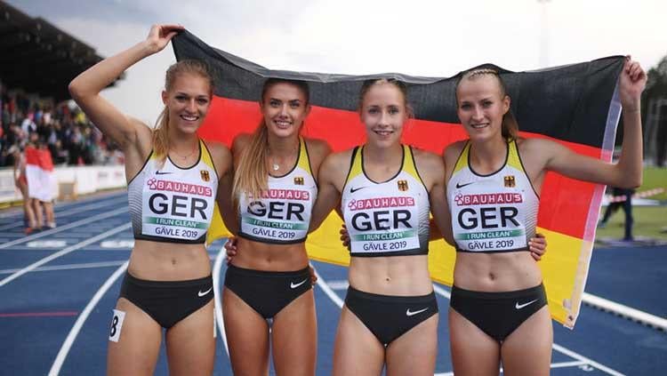 Atlet lari asal Jerman, Alica Schmidt (kedua dari kiri), punya abs berkat ketekunannya berolahraga. Foto: Oliver Hardt/Getty Images for European Athletics. - INDOSPORT