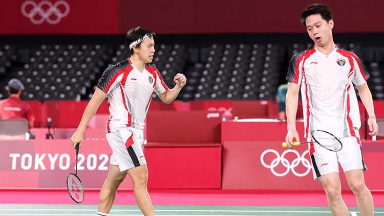 Aksi Kevin Sanjaya/Marcus Fernaldi Gideon saat melawan ganda India, Satwiksairaj Rankireddy/Chirag Shetty di Olimpiade Tokyo 2020.