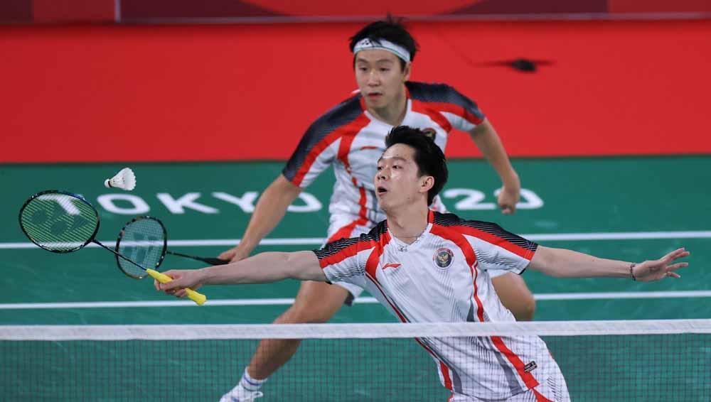 Pasangan ganda putra Indonesia, Kevin Sanjaya/Marcus Gideon saat tampil di Olimpiade Tokyo 2020.