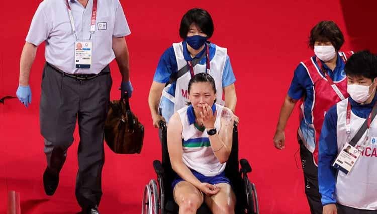 sempat cedera parah di Olimpiade Tokyo, Zhang Beiwen gembira bisa kembali berlatih. - INDOSPORT