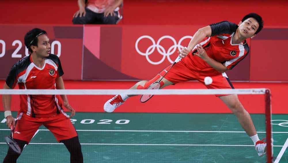 Pebulutangkis ganda putra Indonesia Hendra Setiawan/Mohammad Ahsan di Olimpiade Tokyo 2020. - INDOSPORT