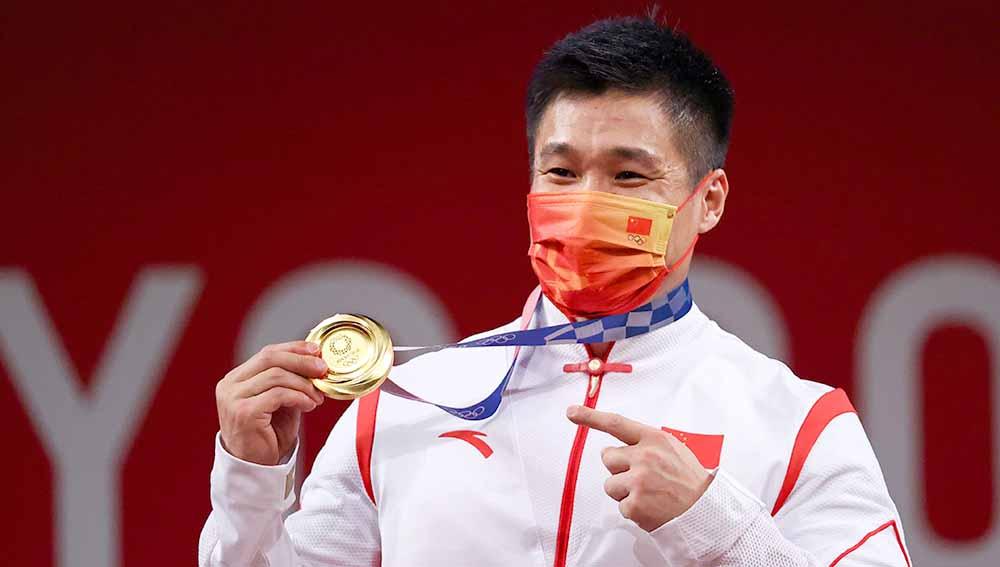 Lyu Xiaojun, lifter asal China.