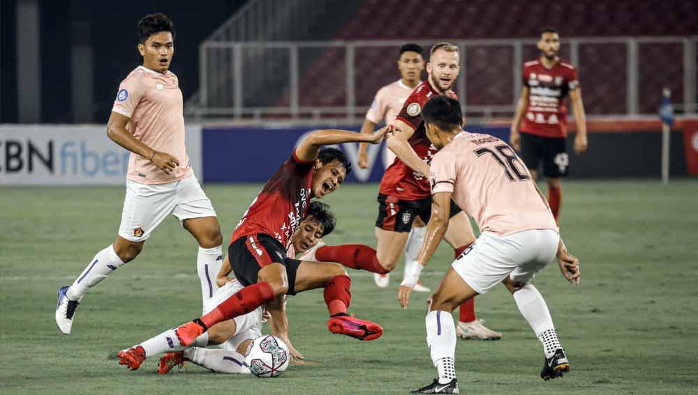 Kemenangan Bali United atas Persik Kediri di laga pembuka Liga 1 2021/22 menyisakan sedikit polemik terkait penyelamatan penalti yang dilakukan Wawan Hendrawan. - INDOSPORT
