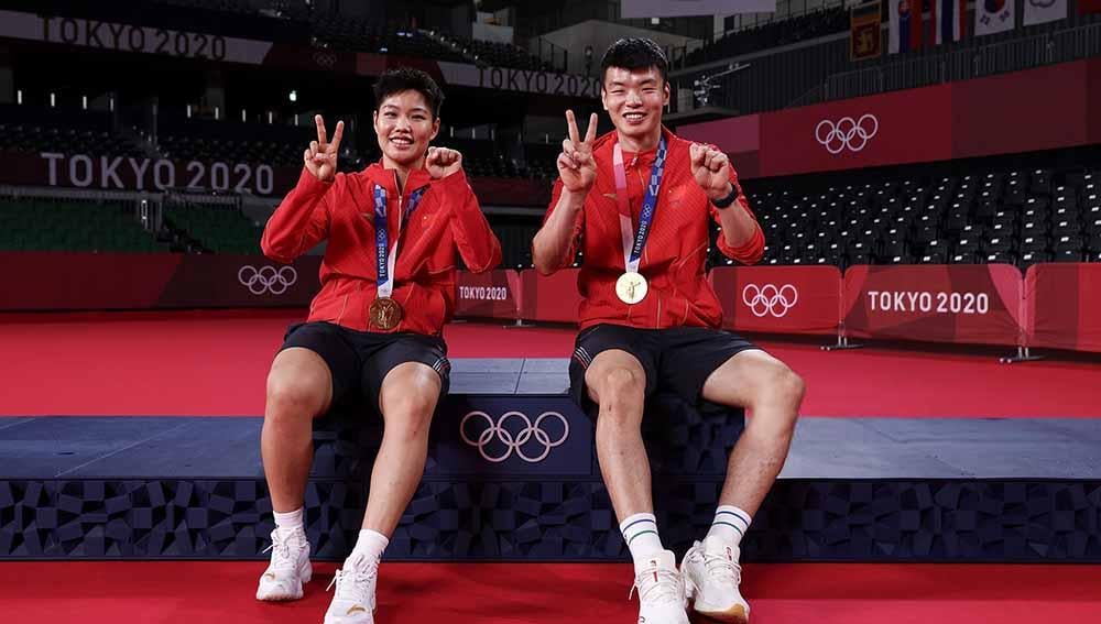 Dua atlet berlabel juara Olimpiade Tokyo ini memiliki nasib buruk pada 2022, sehingga rawan dirombak di musim depan, termasuk Wang Yi Lyu/Huang Dong Ping. - INDOSPORT