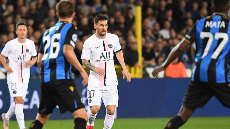 Aksi Lionel Messi di laga Club Brugge vs PSG dalam ajang Liga Champions.