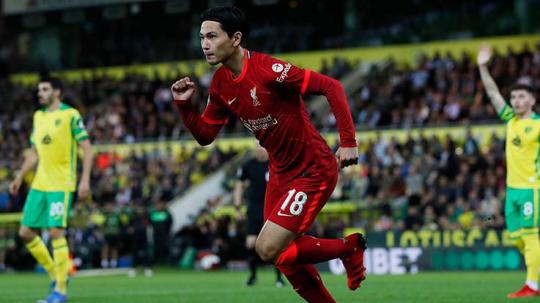 Takumi Minamino tengah santer dikaitkan dengan pintu keluar klub Liga Inggris, Liverpool. Foto: Reuters.