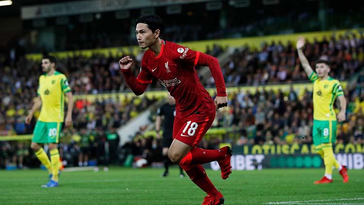 Selebrasi gol Takumi Minamino di laga Norwich City vs Liverpool.
