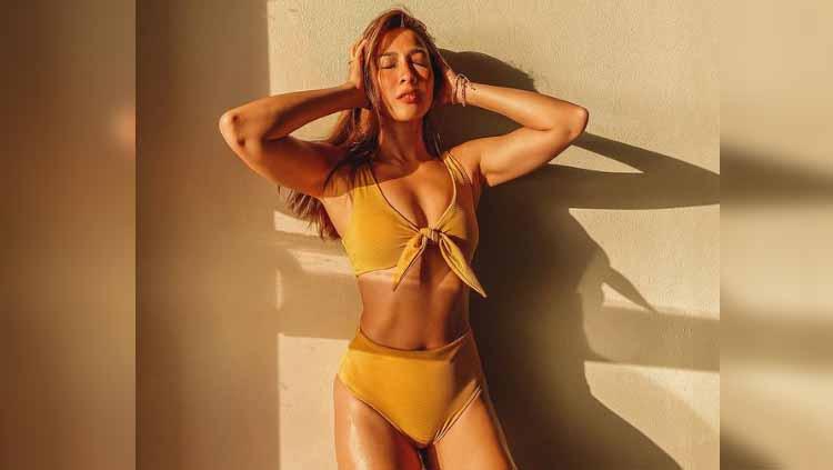 Penampilan body goals Andrea Dian tuai pujian netizen