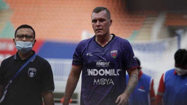 Indosport - Mantan bek klub Liga 1, Persita Tangerang, Adam Mitter.