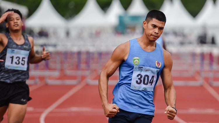 Atlet asal Sumatra Selatan, Rio Maholtra yang memecahkan rekor lari gawang 110 meter putra di PON XX Papua - INDOSPORT