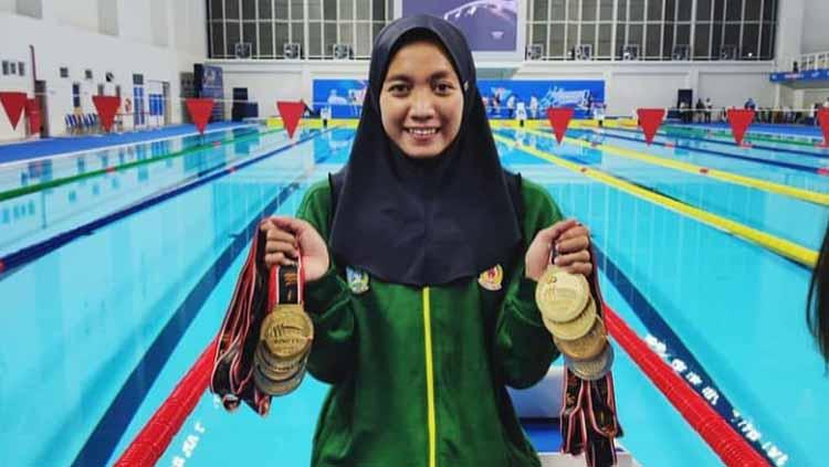 Adinda Larasati Dewi Perenang Cantik Pemborong Medali Emas Pon Papua Indosport<script async src=