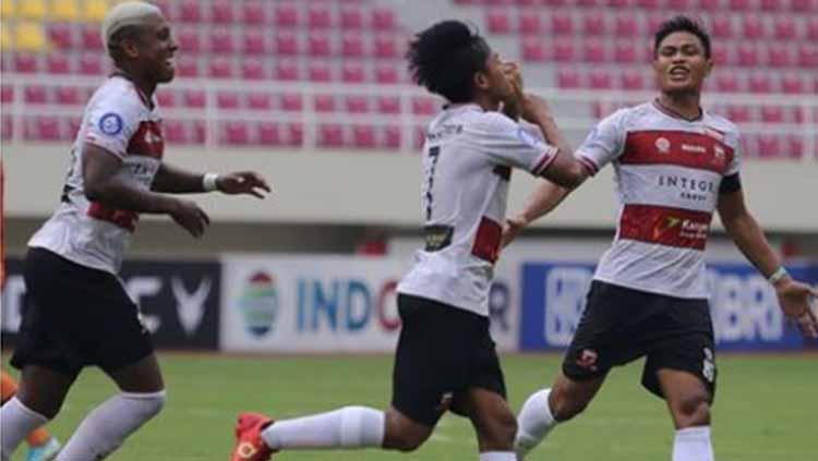 Selebrasi pemain Madura United, Bayu Gatra, dalam pertandingan Liga 1 melawan Persiraja Banda Aceh. - INDOSPORT