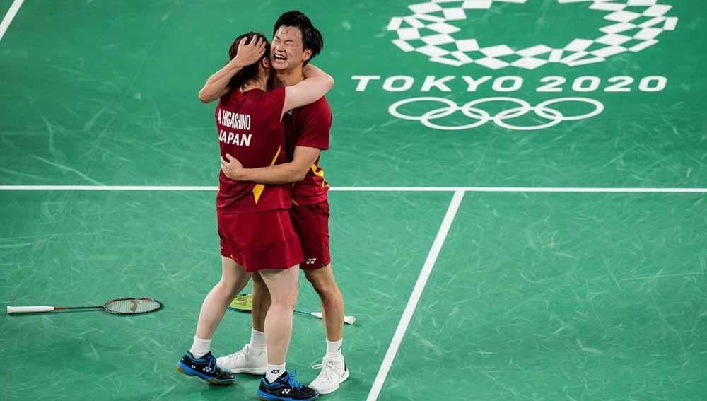 Netizen dibuat baper atas selebrasi manis Yuta Watanabe/Arisa Higashino saat memenangkan medali perunggu Olimpiade Tokyo 2020. - INDOSPORT