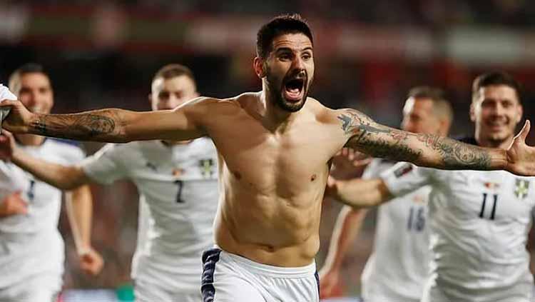 Aleksandar Mitrovic melakukan selebrasi melawan Portugal