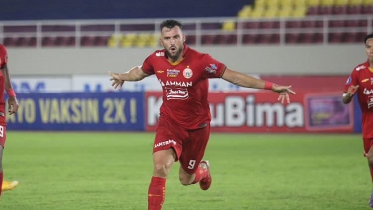 Selebrasi gol Marko Simic di laga Liga 1 Persib Bandung vs Persija Jakarta. Kini ia terpantau sedang berada di Bali. - INDOSPORT